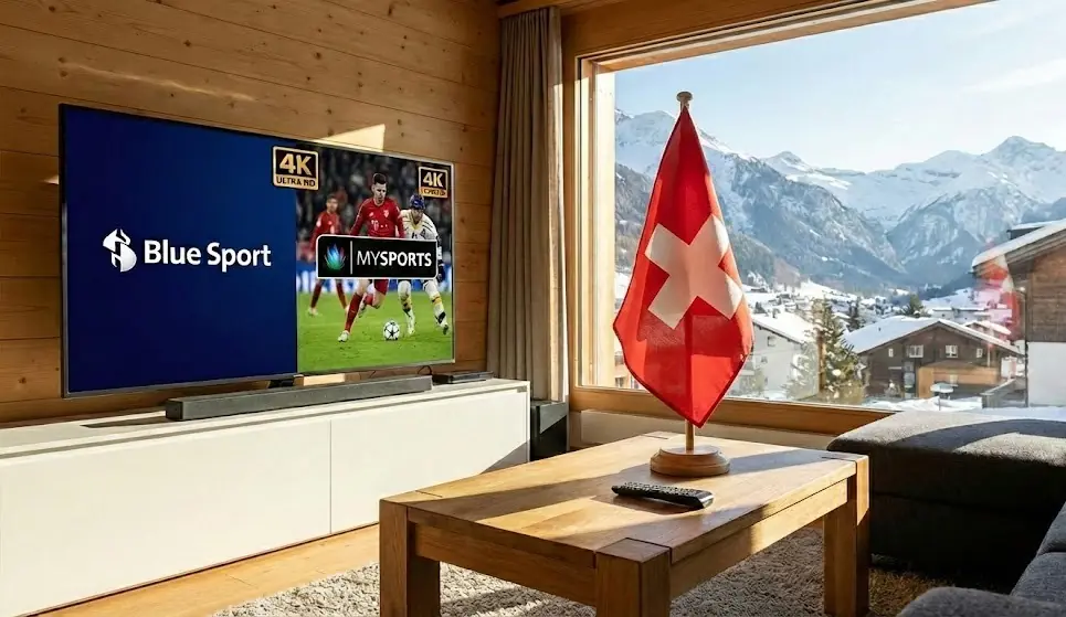 Télévision 4K dans un salon suisse moderne avec vue sur les Alpes